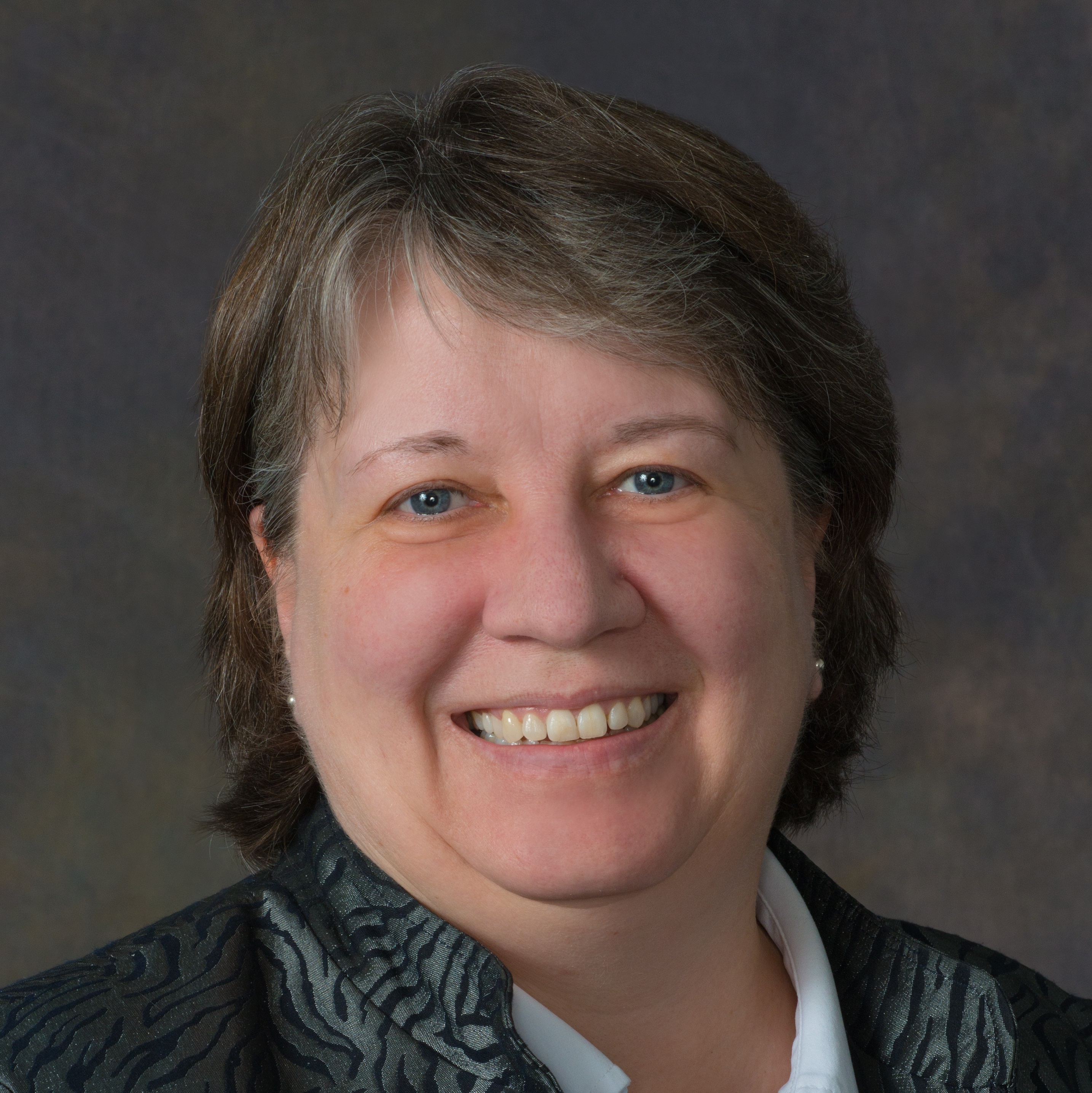 Headshot of Joan Almost